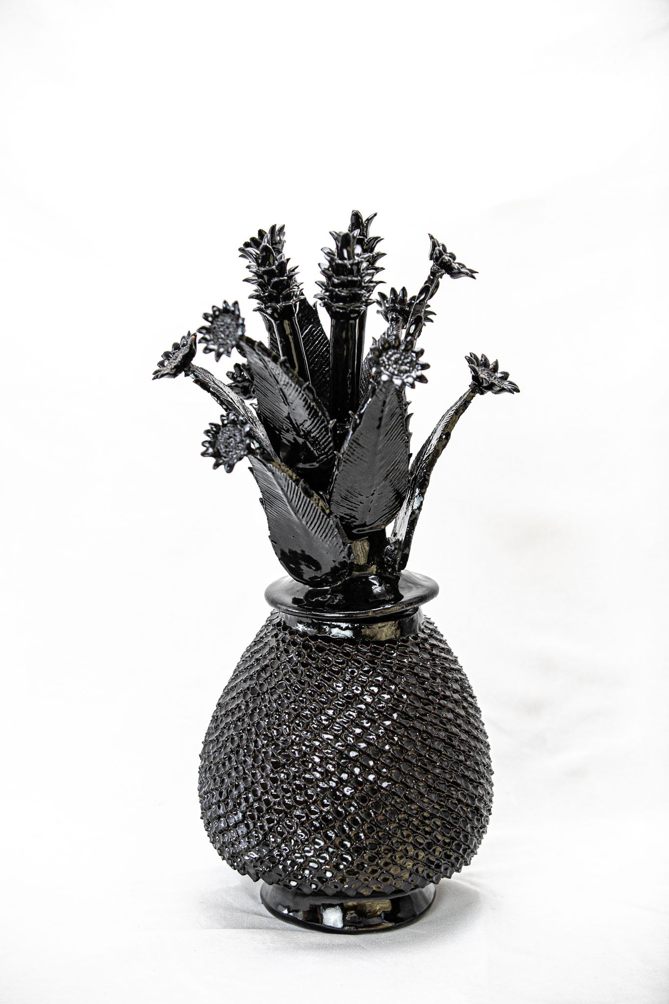 Piña cantarito, tapa de flores